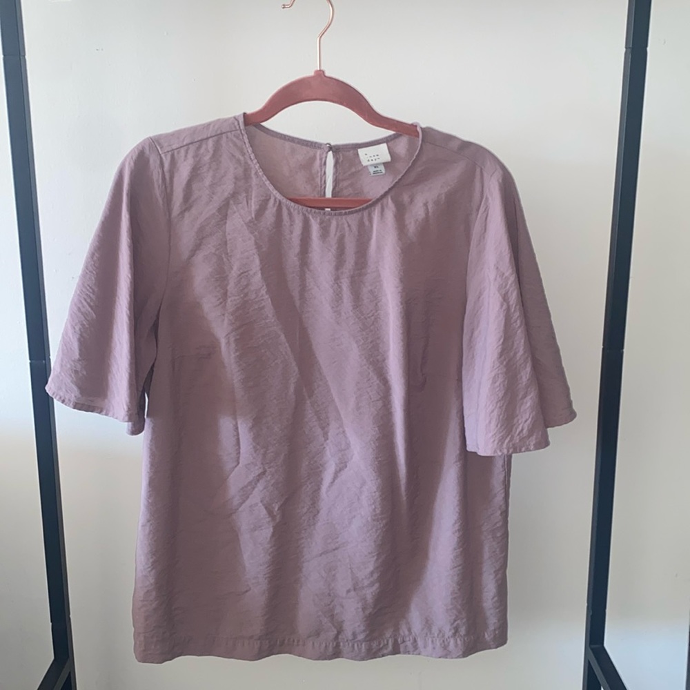 Light purple blouse.
